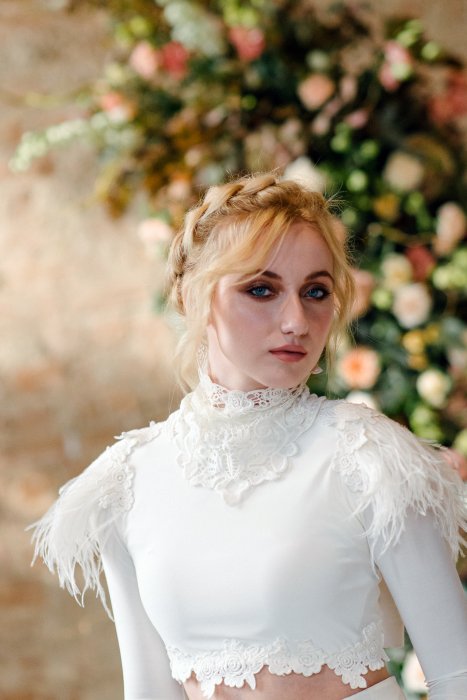 blond bride in white long sleeves dress in Thessaloniki 