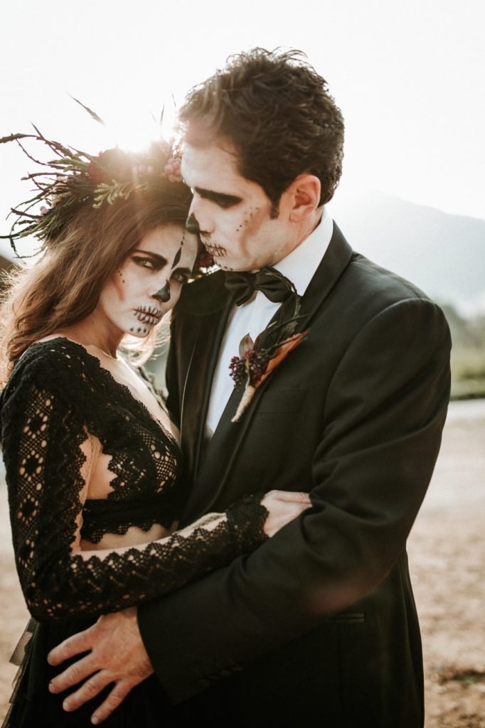 Sunset couple hugging Halloween Wedding inspiration
