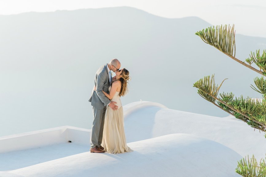 Hellenic Chic Elopement couple on the rooftop in Santorini