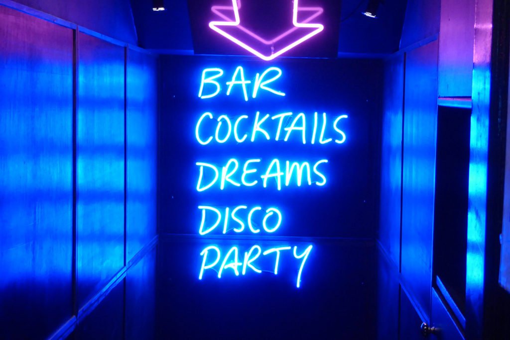 Neon Signs at a bar for Destination Bridal Shower