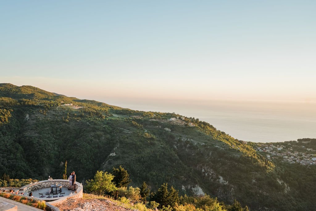 Same-sex vow renewal in Lefkada with gorgeous view of the mountain and the sea. 