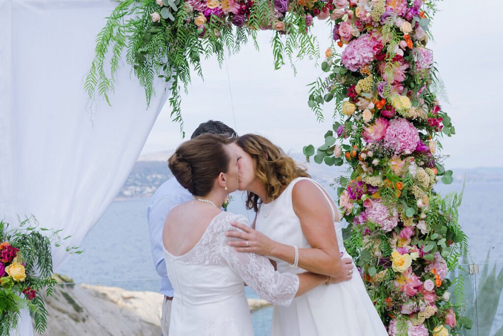 Lesbian Wedding in Greece Ceremony with colourful flowers