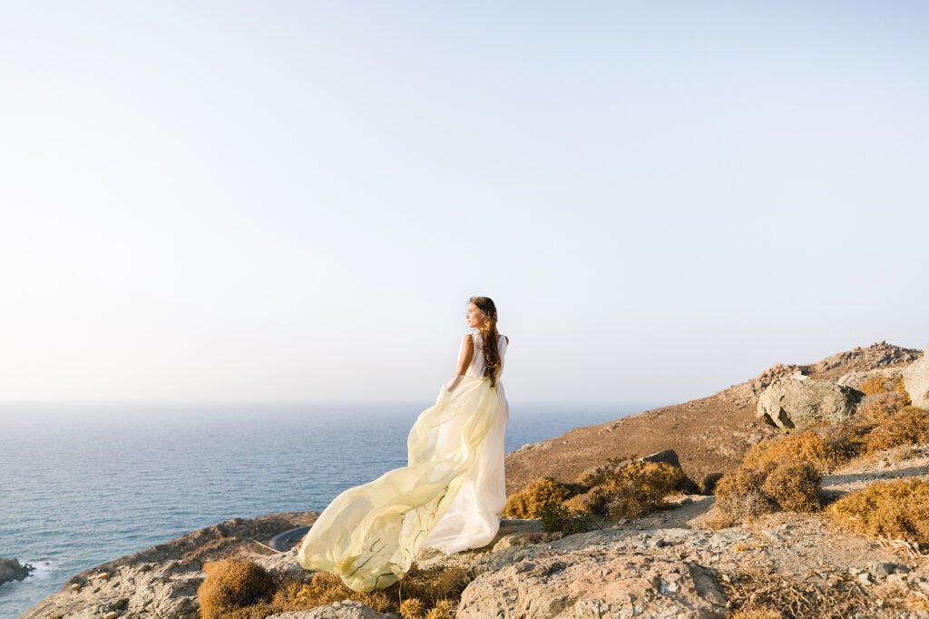 Natural Minimalist Elopement bride standing on a hill in Naxos