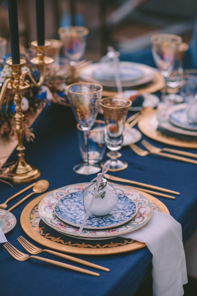 Magical Destination Christmas Wedding Table Setup art de la table with gold and blue