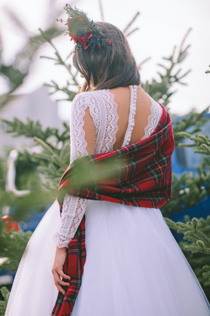 Magical Destination Christmas Bride with White dress and red shall