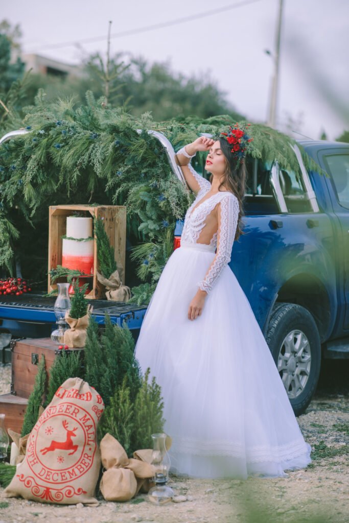 Magical Destination Christmas Wedding Inspiration with bride and a pickup truck