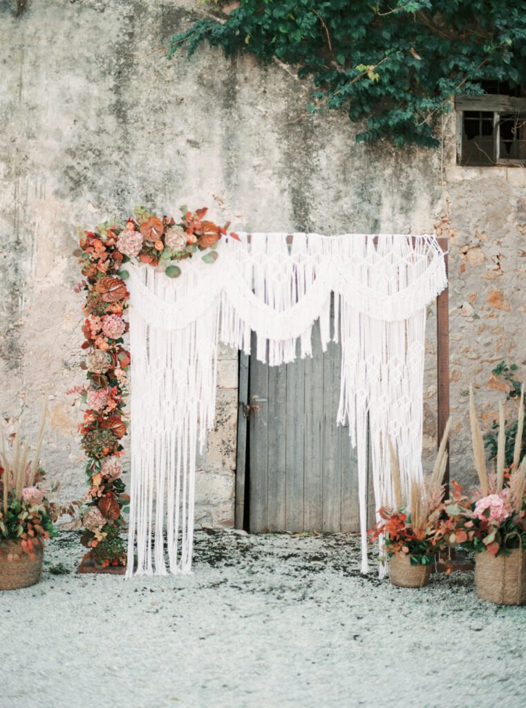 Bogo macramé backdrop for Luxe End of Summer Wedding Inspiration from Crete