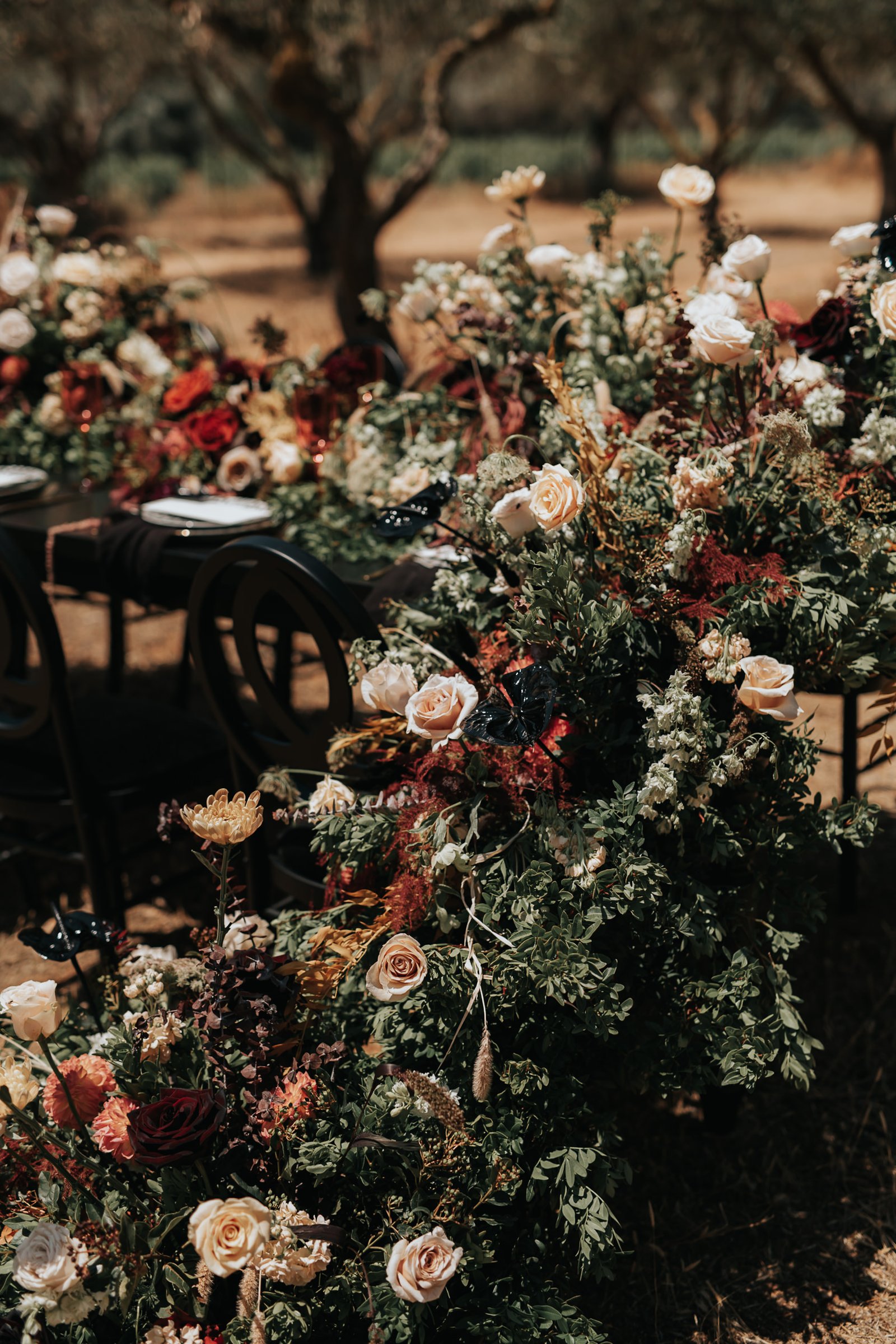 Bohemian Rhapsody Bridal Inspiration table setup with lush florals