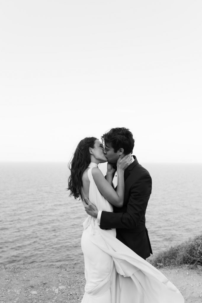 stylish eco-conscious wedding of Kat & Jared kissing