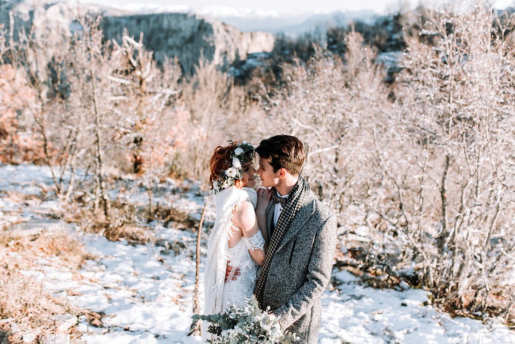 Mountain Top Elopement Inspiration with couple hiking in the woods 
