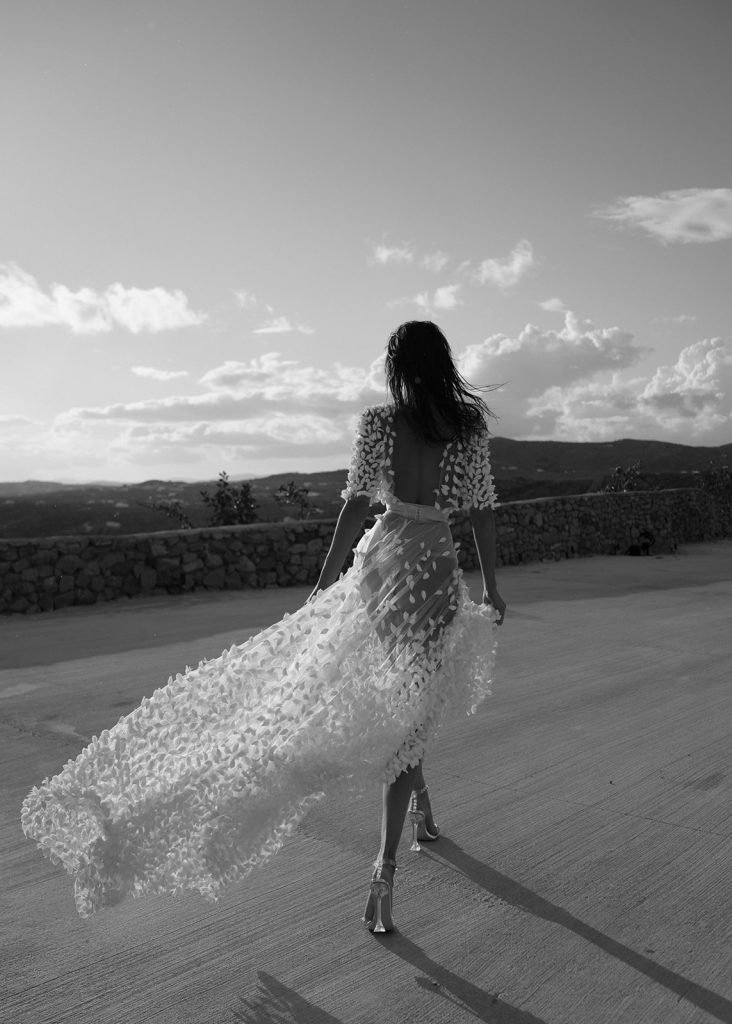 Stylish Bride walking away at her Intimate Myconian Wedding