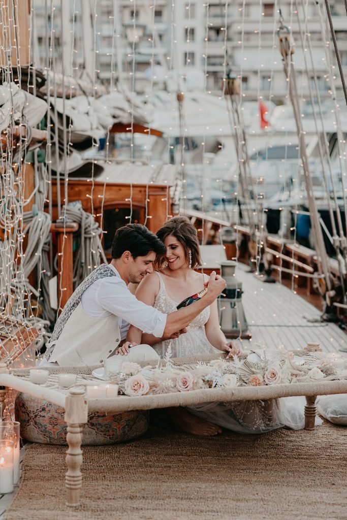 Elopement Shoot on a Historic Yacht couple celebrating