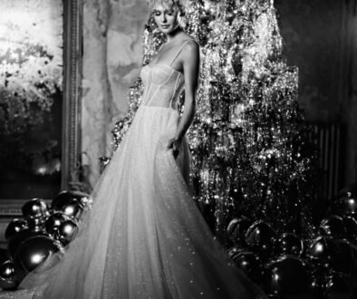 19 Christmas Wedding Ideas from Ellwed Bide Infront of the Christmas tree