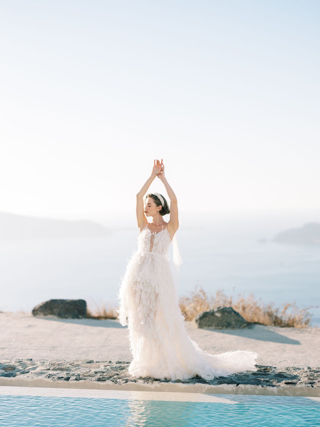 Bride posing with Wedding Dress at Rocabella Santorini 