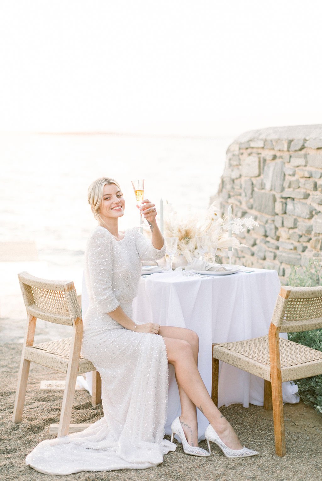 Plan Your Wedding Like a Pro bride cheering with Champagne