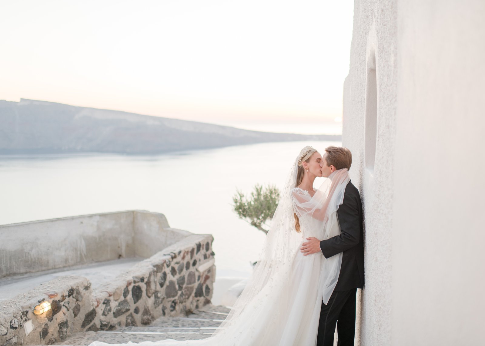 Bride & Groom kissing in Santorini 