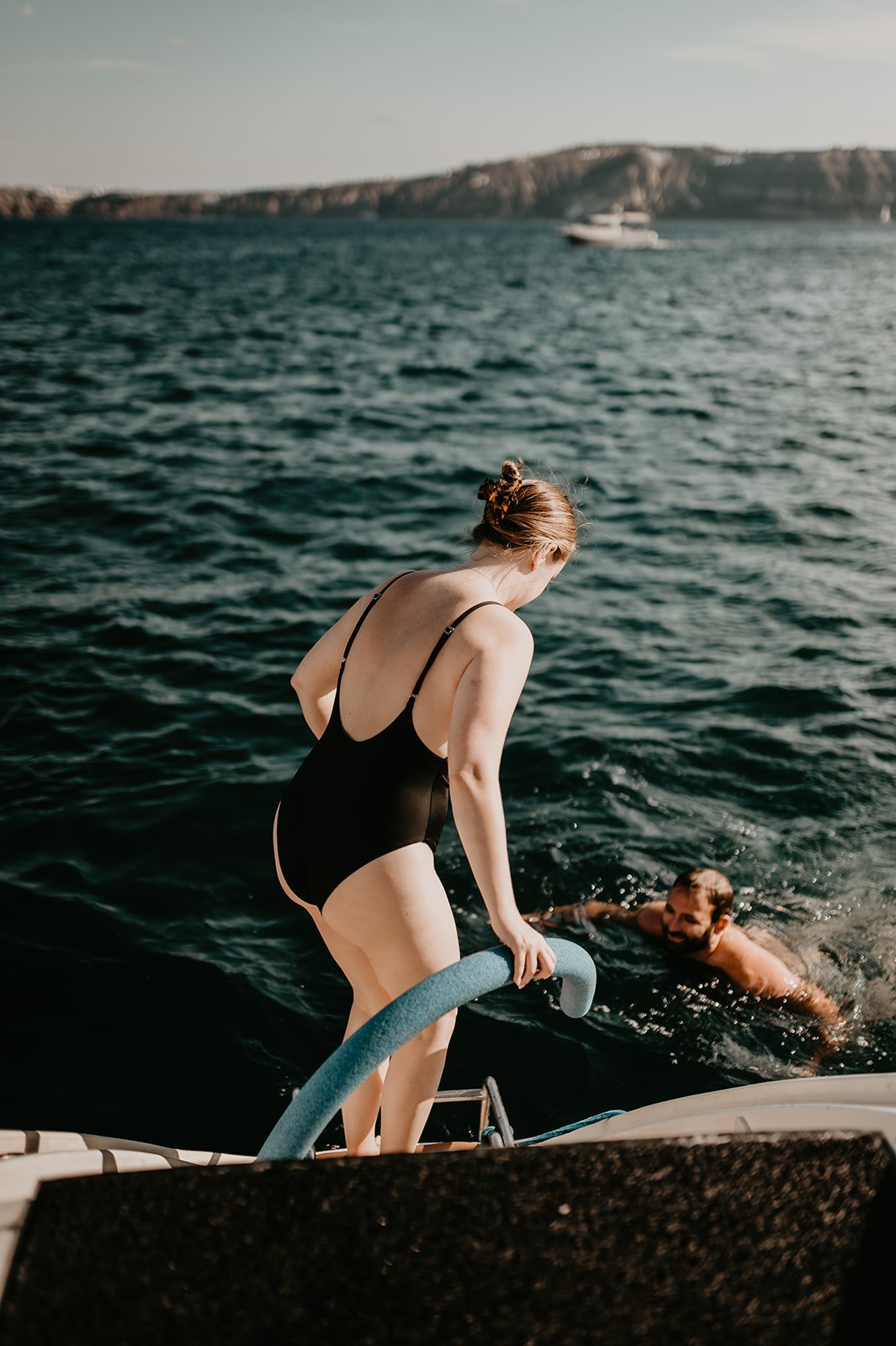 Bride Jumping in the sea from a boat