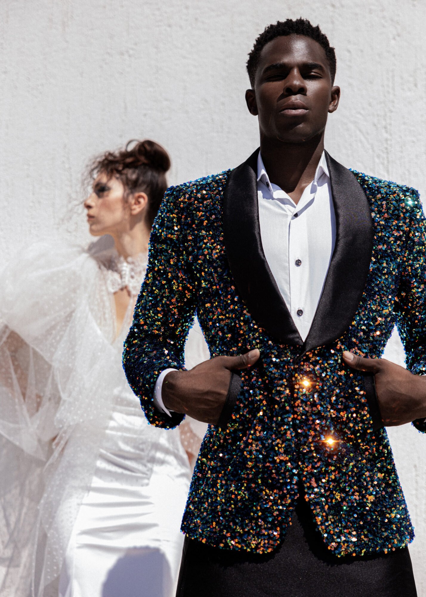 Contemporary Greek Wedding Inspiration Fashionable Groom in glitter Jacket