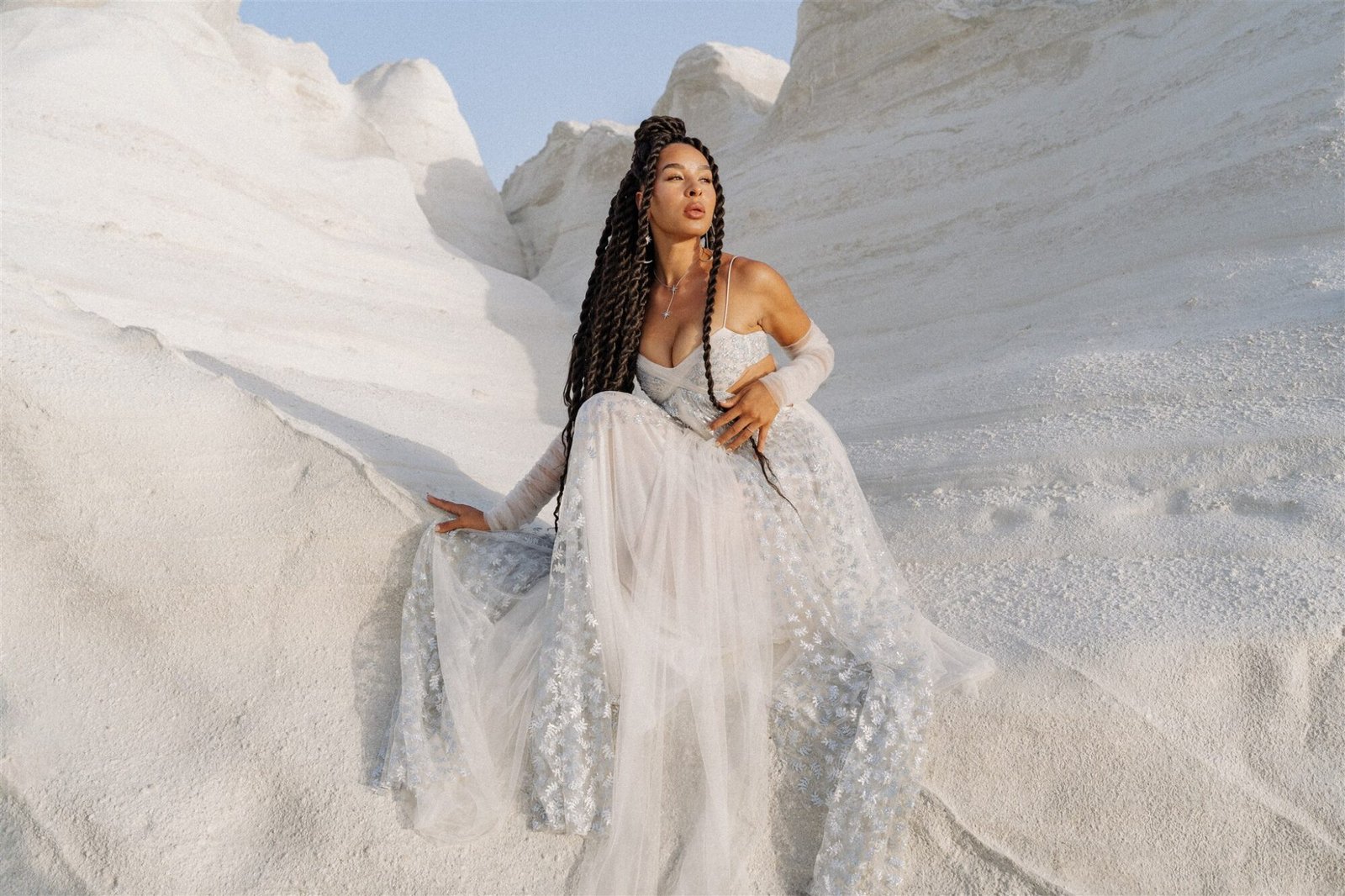 Celestial Elopement Inspiration Milos bride on the white rocks