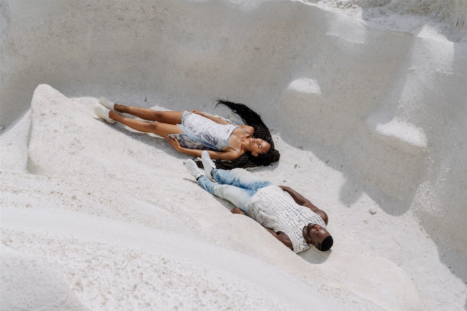 Celestial Elopement Inspiration Milos couple lying on the beach