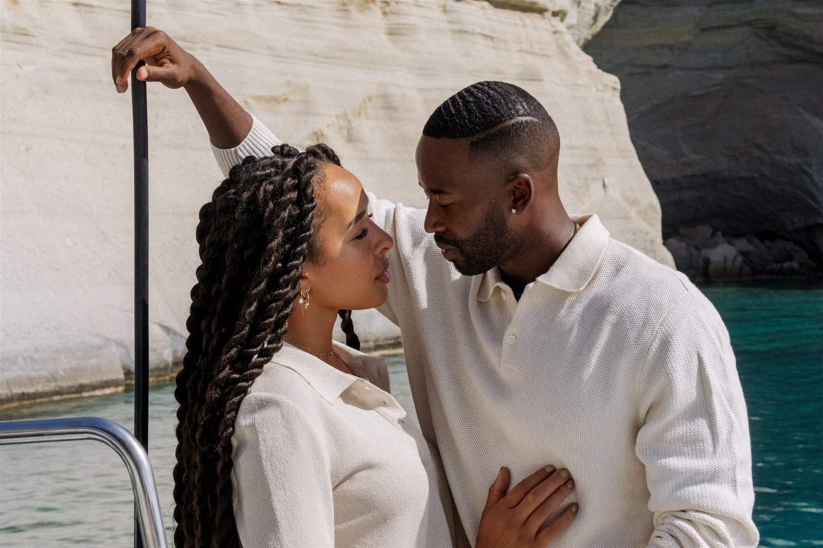 Celestial Elopement Inspiration Milos couple kissing on the catamaran 