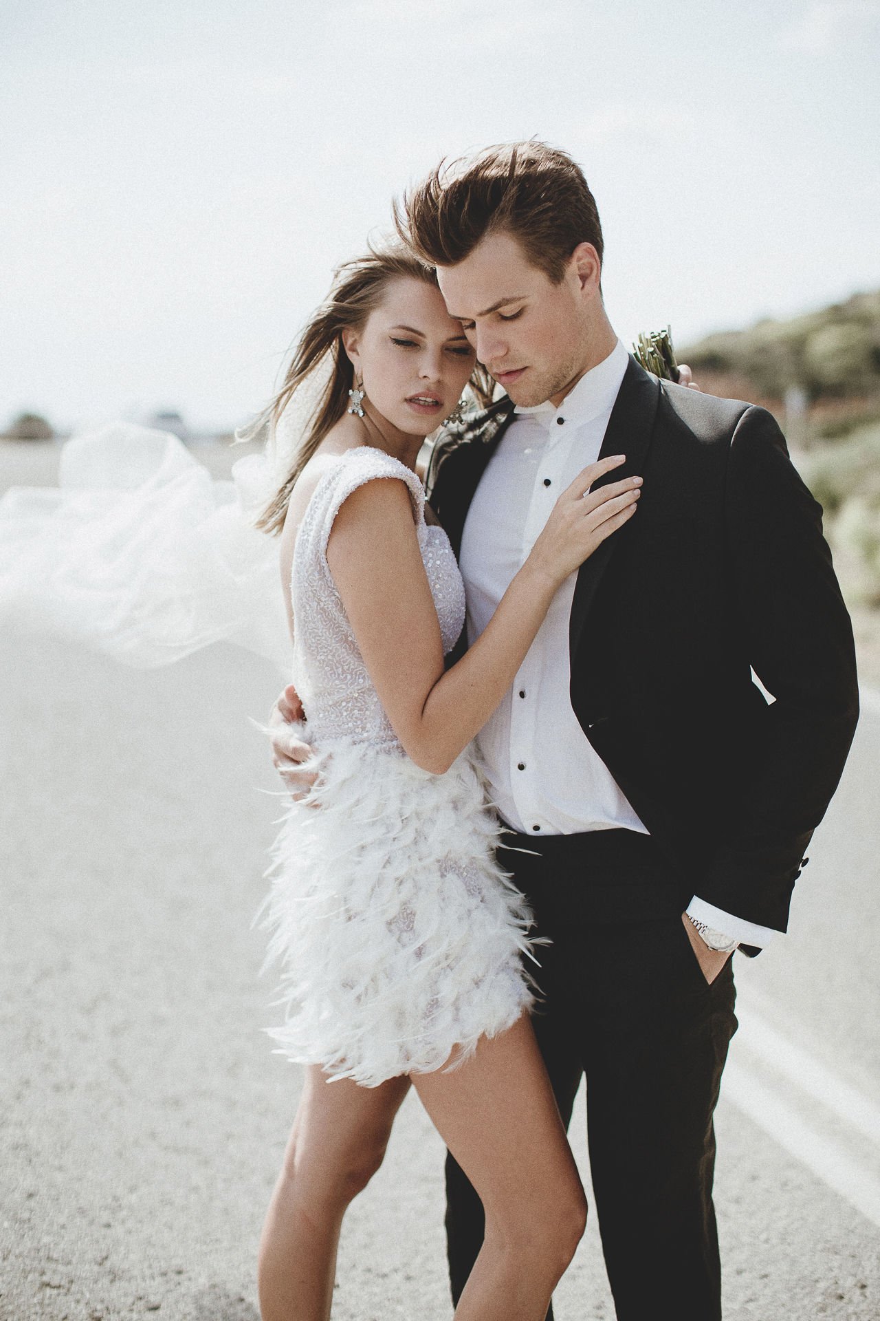 Athenian Riviera Elopement in Greece couple posing on the road