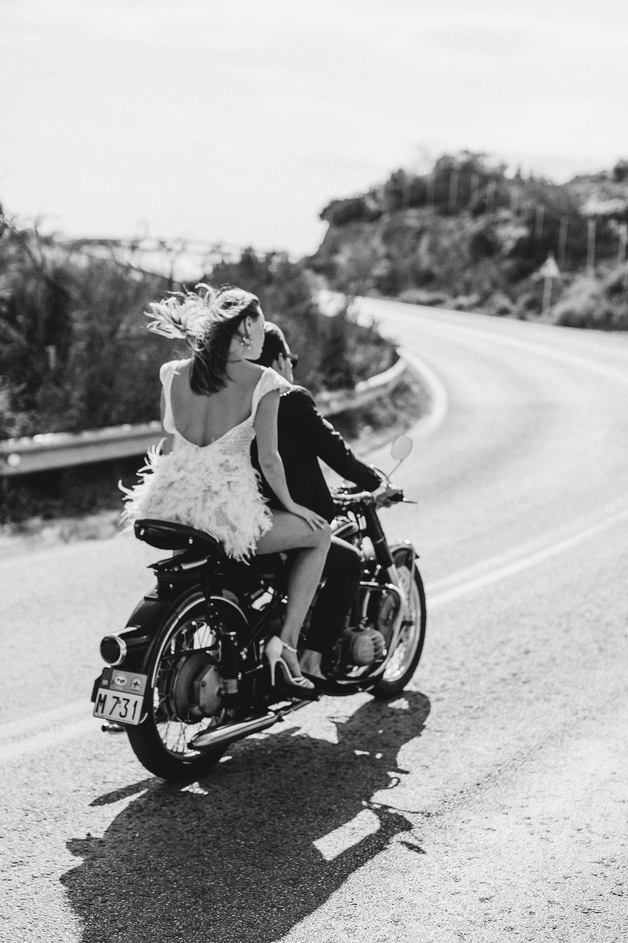 Athenian Riviera Elopement in Greece Couple riding the bike