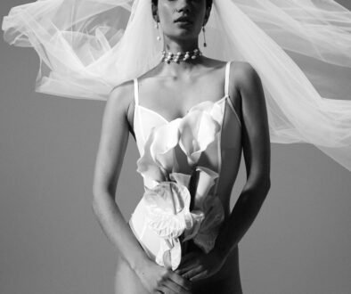 The FALKE Bridal Legwear x Kaviar Gauche bride with flower in the hand