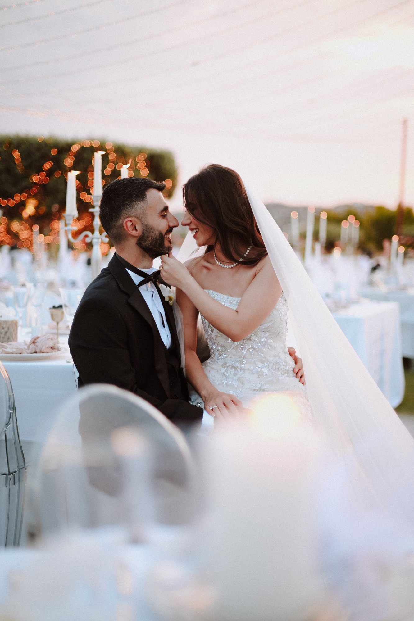 Wedding at the Athenian Manor Estate Bride and groom sitting at the table