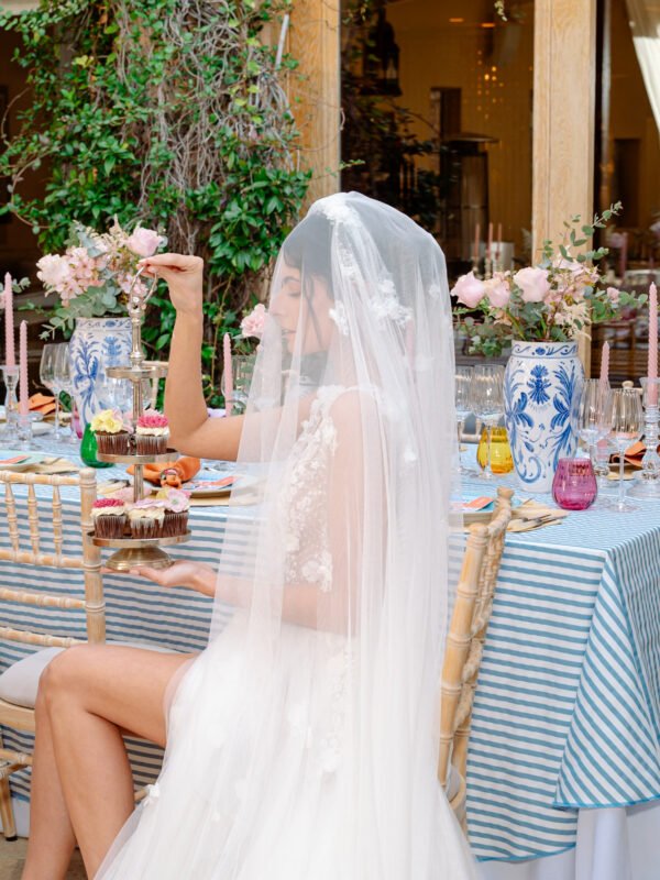 Destination Wedding ETIAS bride eating cakes