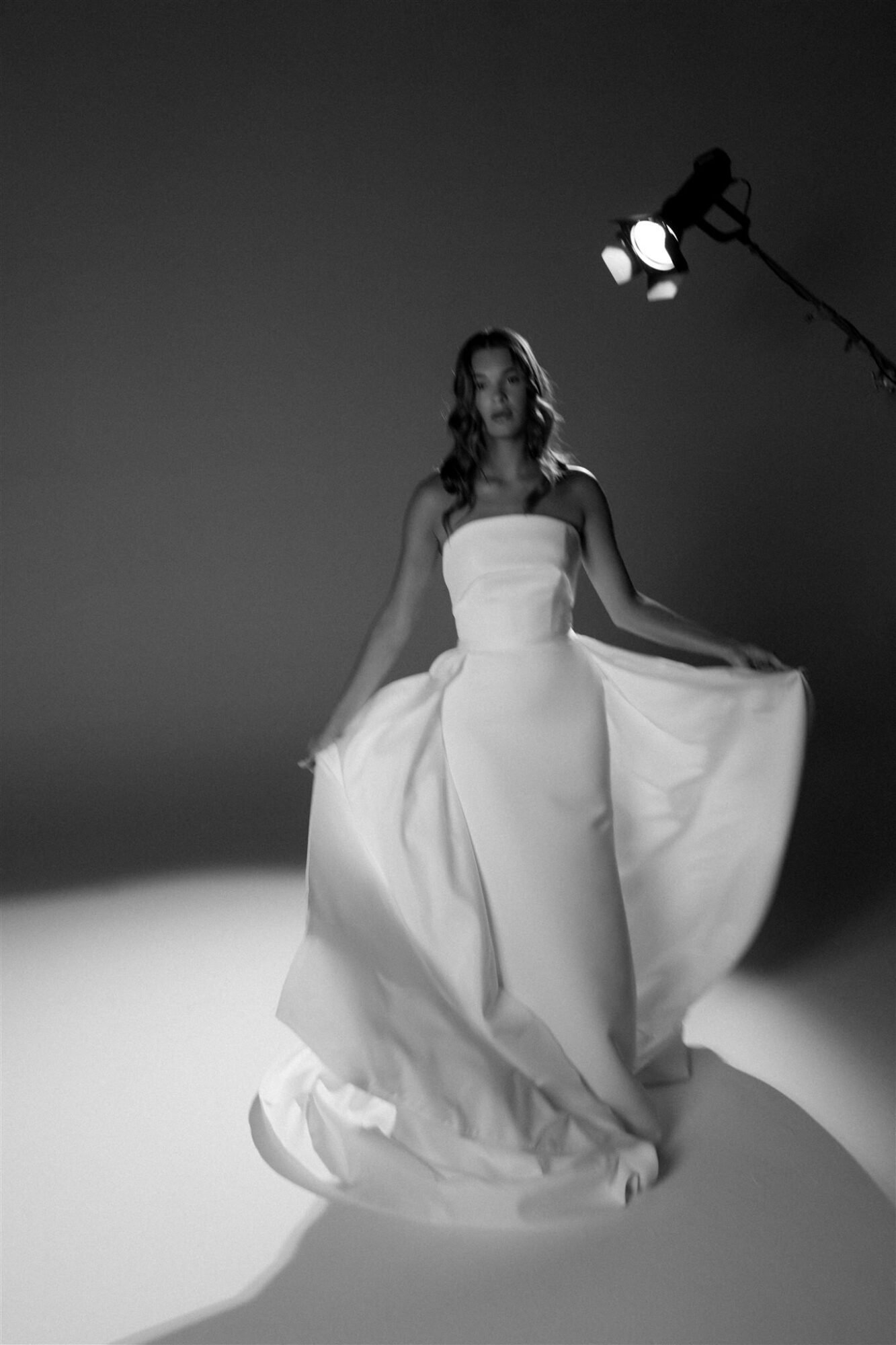 Modern romantic bridal silhouette from Hera Couture Serene Echoes collection for Greek island sunset wedding