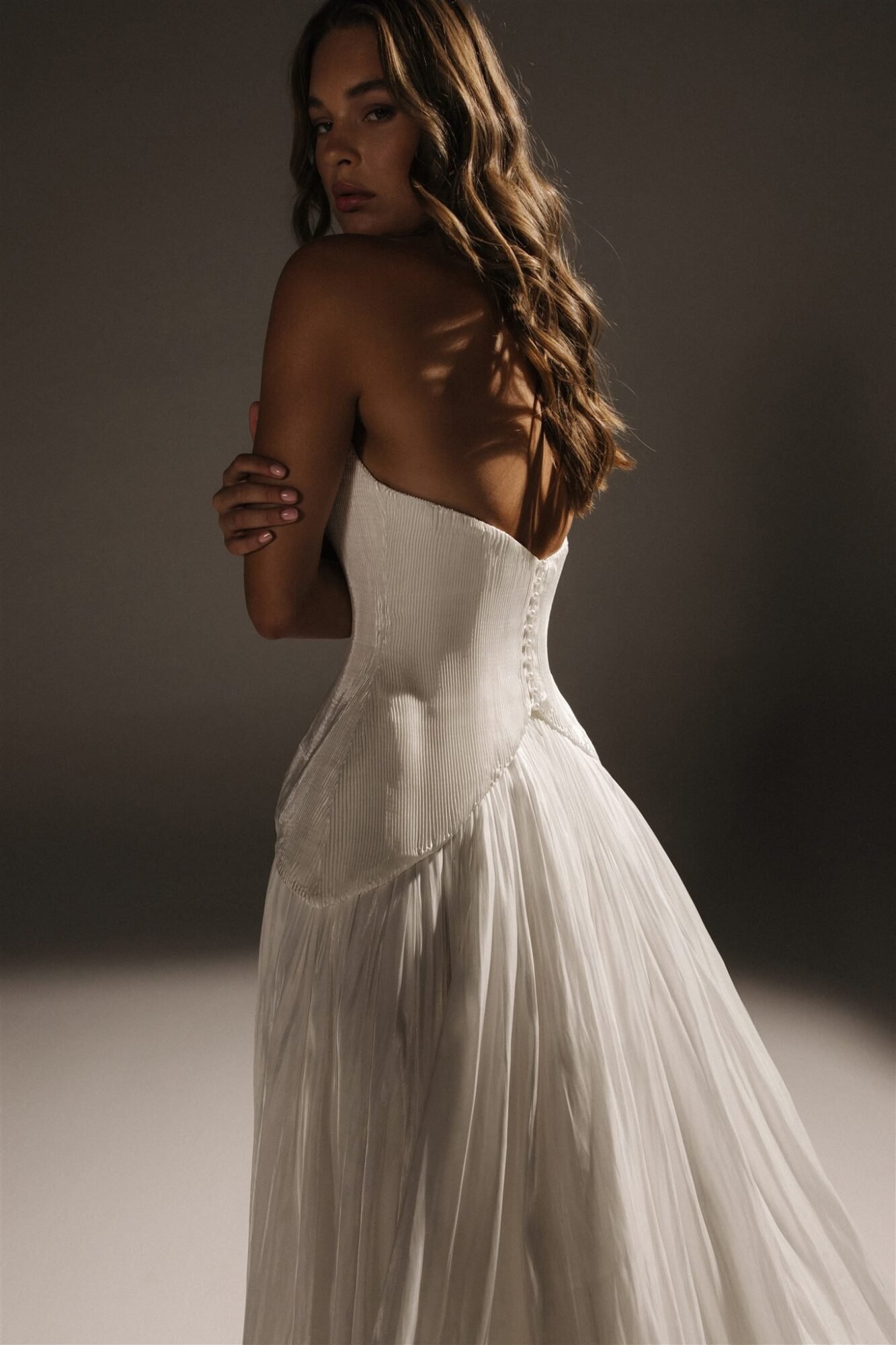 Lightweight silk gown with flowing skirt ideal for Santorini destination wedding