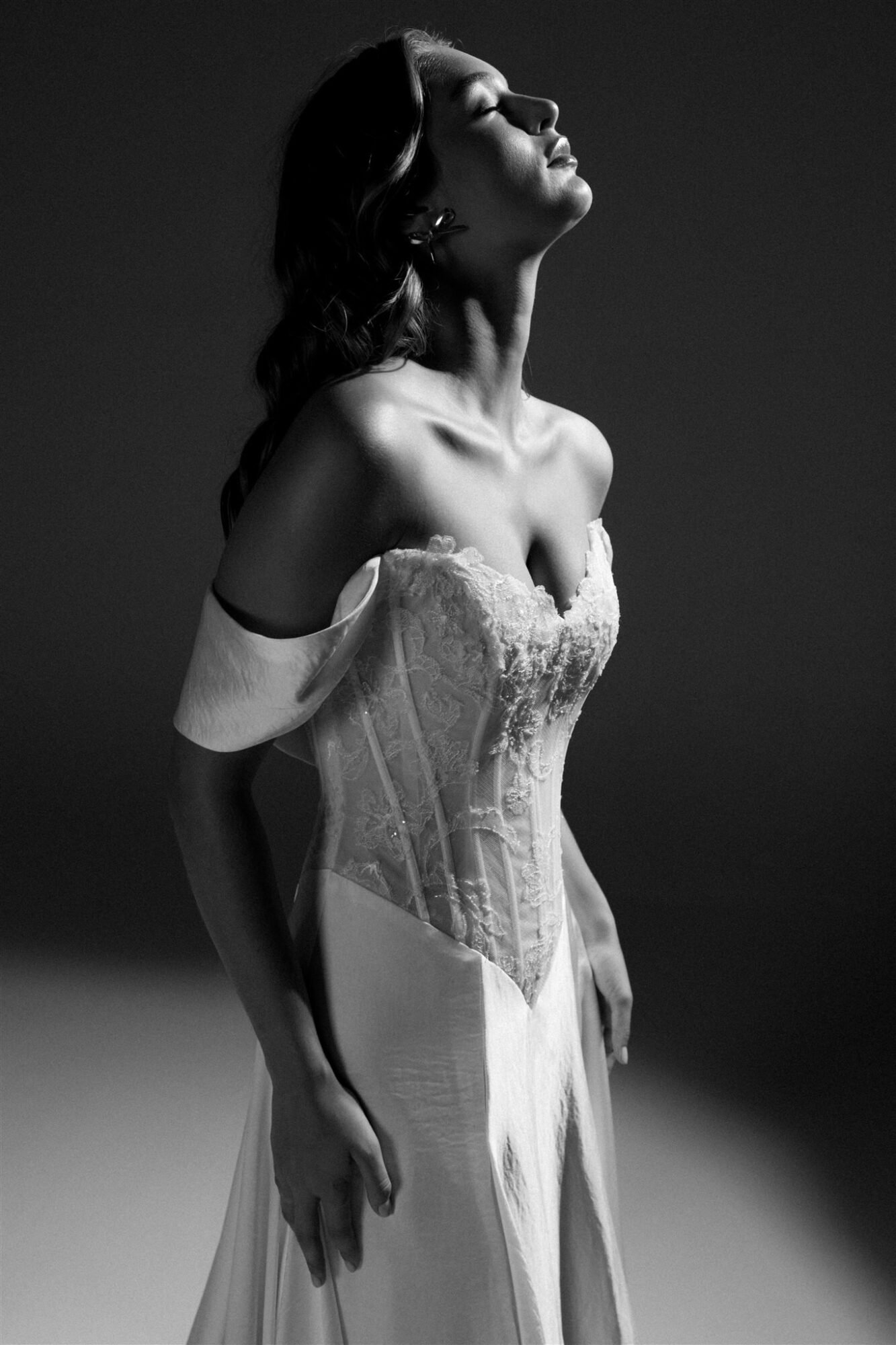 Hand-applied petal lace and floral embroidery on luxury wedding dress for Greek island ceremony