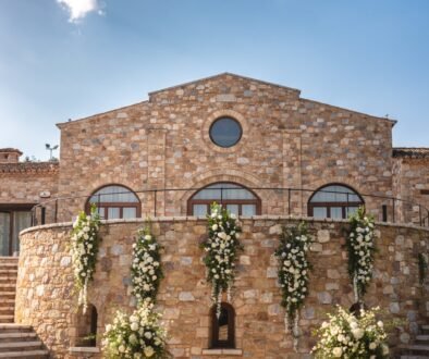 White elegant & comfortable destination wedding at a Greek manor venue and blue sky