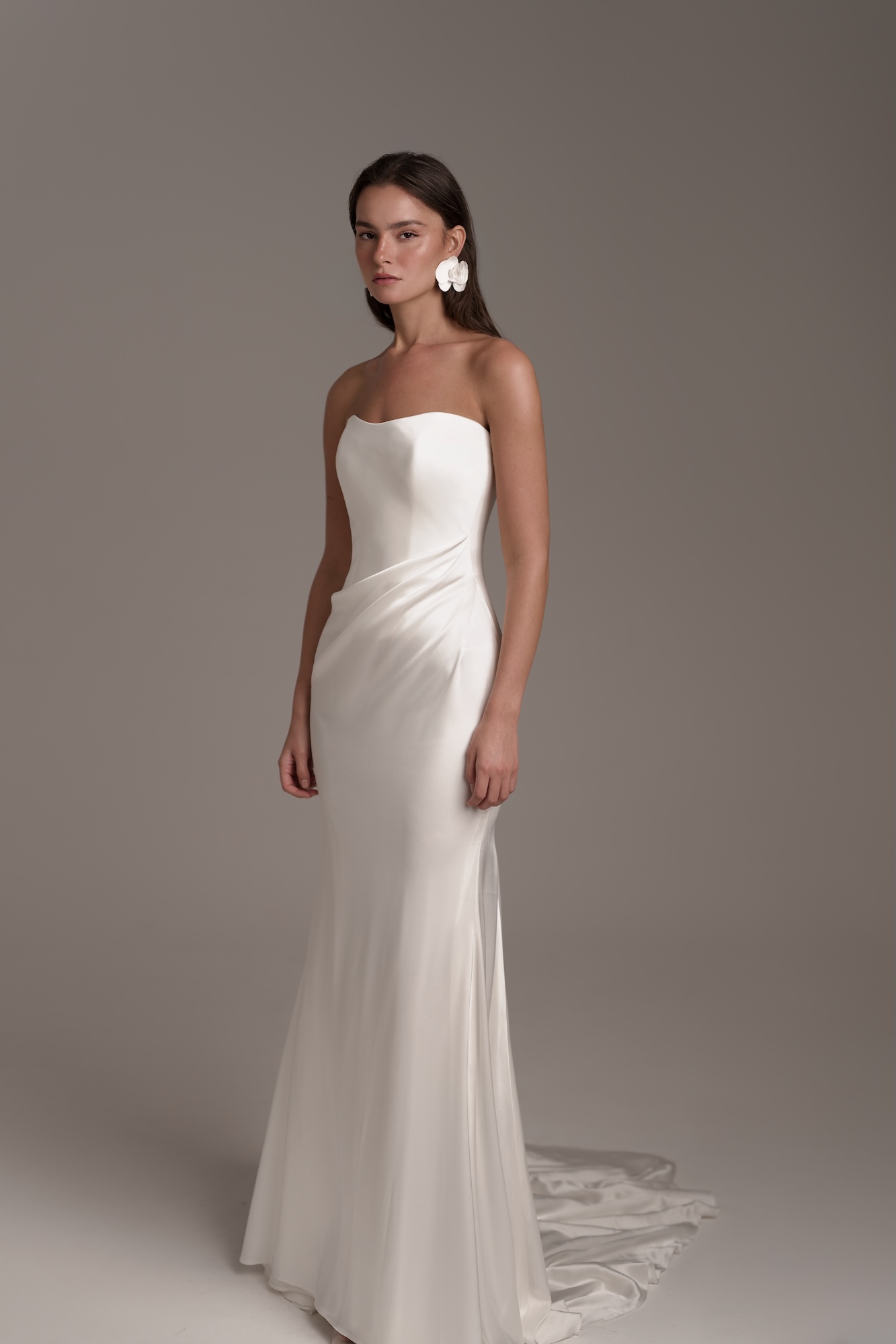 Ophelia, by Lihi Hod, strapless silk satin fit-and-flare wedding dress with an asymmetrically draped bodice