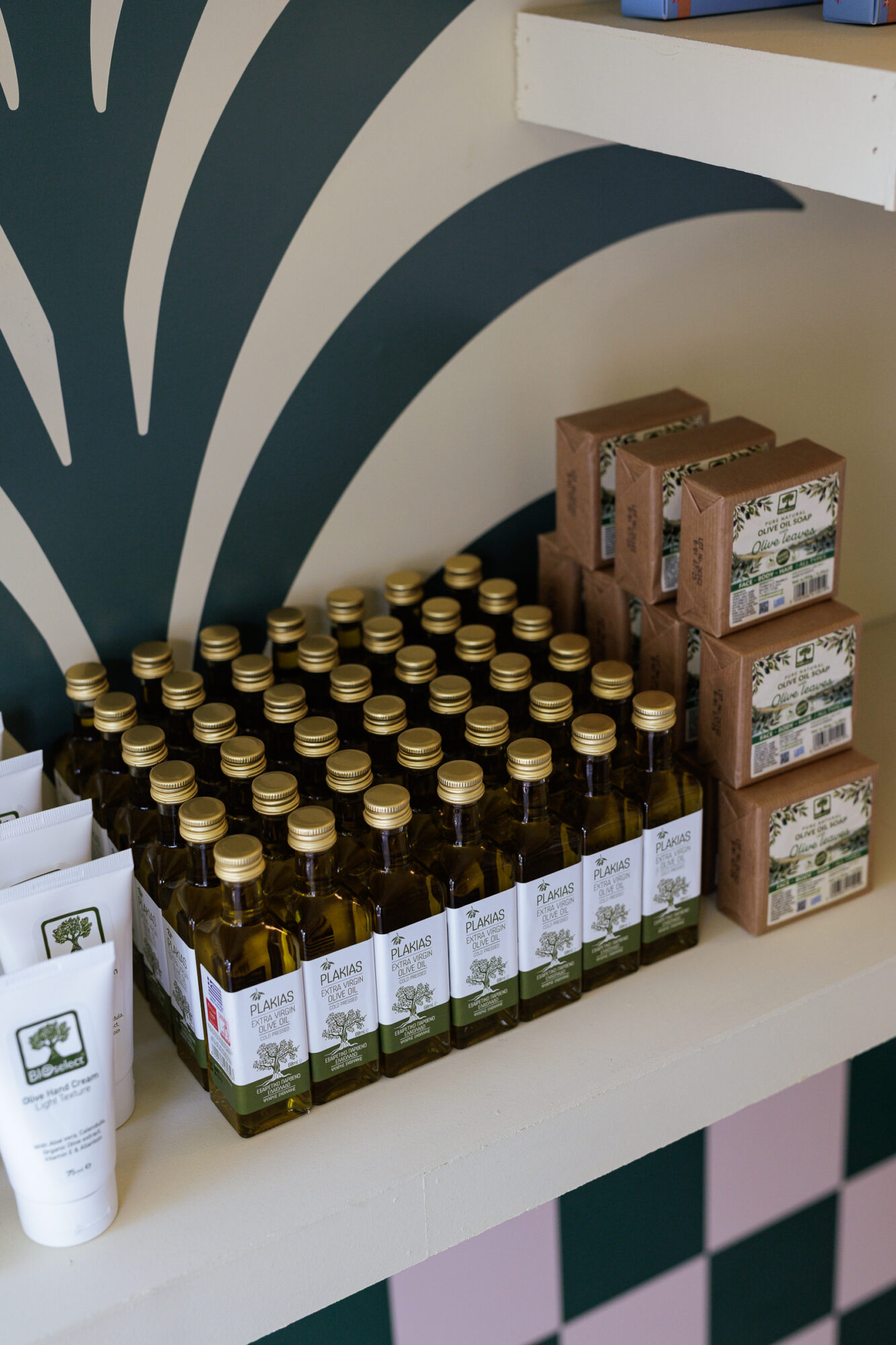 Closeup of mini Greek olive oil bottles and olive soap for wedding gift bags