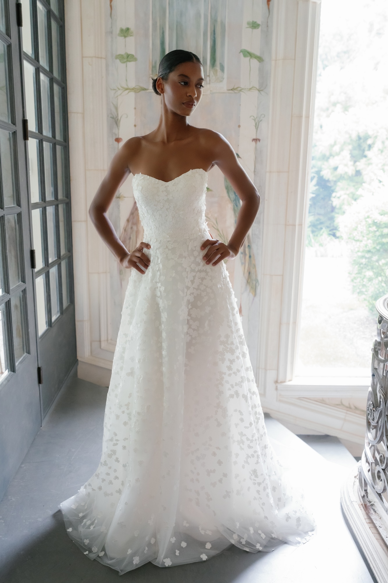 Second Glance wedding dress with three-dimensional floral lace, a soft sweetheart neckline and an A-line tulle skirt.